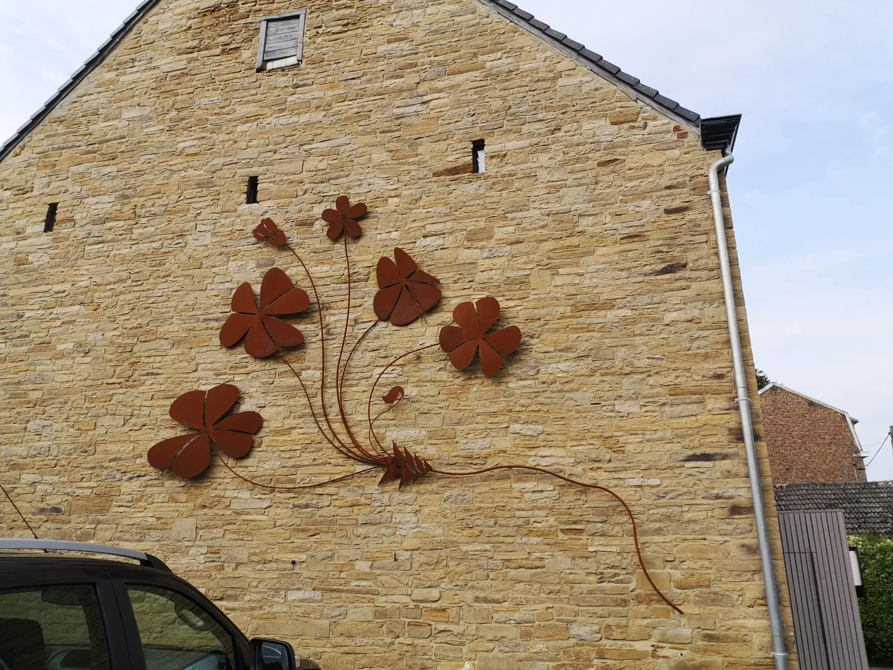 Décoration en acier corten réalisée sur mesure par Design Ferronnerie